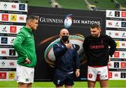 5 February 2022; Referee Jaco Peyper makes the toss in the presence of Ireland captain Jonathan Sexton, left, and Wales captain Dan Biggar the Guinness Six Nations Rugby Championship match between Ireland and Wales at the Aviva Stadium in Dublin. Photo by Harry Murphy/Sportsfile