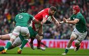 5 February 2022; Dan Biggar of Wales is tackled by, from left, James Ryan, Andrew Porter and Josh van der Flier of Ireland during the Guinness Six Nations Rugby Championship match between Ireland and Wales at the Aviva Stadium in Dublin. Photo by Brendan Moran/Sportsfile