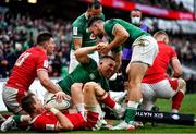 5 February 2022; Andrew Conway of Ireland celebrates with teammates Jamison Gibson Park, behind, and Hugo Keenan after scoring their side's second try during the Guinness Six Nations Rugby Championship match between Ireland and Wales at the Aviva Stadium in Dublin. Photo by Brendan Moran/Sportsfile