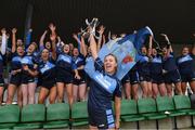 5 February 2022; CLG Naomh Jude captain Aoife Keyes lifts the cup as her team-mates celebrate after the 2021 currentaccount.ie All-Ireland Ladies Junior Club Football Championship Final match between Mullinahone LGF, Tipperary and CLG Naomh Jude, Dublin at Baltinglass GAA in Baltinglass, Wicklow. Photo by Matt Browne/Sportsfile