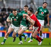 5 February 2022; Andrew Conway of Ireland is tackled by Dan Biggar of Wales during the Guinness Six Nations Rugby Championship match between Ireland and Wales at the Aviva Stadium in Dublin. Photo by Brendan Moran/Sportsfile
