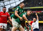 5 February 2022; Garry Ringrose of Ireland, right, celebrates with teammate Andrew Conway after scoring his side's fourth try during the Guinness Six Nations Rugby Championship match between Ireland and Wales at the Aviva Stadium in Dublin. Photo by Brendan Moran/Sportsfile