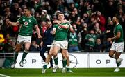 5 February 2022; Garry Ringrose of Ireland celebrates with teammates including, Jonathan Sexton, left, and Jamison Gibson Park, right, after scoring their side's fourth try during the Guinness Six Nations Rugby Championship match between Ireland and Wales at the Aviva Stadium in Dublin. Photo by David Fitzgerald/Sportsfile