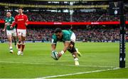 5 February 2022; Bundee Aki of Ireland scores his side's first try during the Guinness Six Nations Rugby Championship match between Ireland and Wales at the Aviva Stadium in Dublin. Photo by John Dickson/Sportsfile