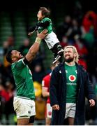 5 February 2022; Bundee Aki of Ireland lifts his one year old son Andronicus Junior Papamau after the Guinness Six Nations Rugby Championship match between Ireland and Wales at the Aviva Stadium in Dublin. Photo by Harry Murphy/Sportsfile
