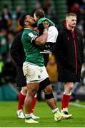 5 February 2022; Bundee Aki of Ireland kisses his one year old son Andronicus Junior Papamau after the Guinness Six Nations Rugby Championship match between Ireland and Wales at the Aviva Stadium in Dublin. Photo by Harry Murphy/Sportsfile