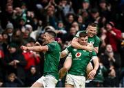 5 February 2022; Garry Ringrose, centre, celebrates after scoring his side's fourth try with Andrew Conway, right, and Jonathan Sexton of Ireland during the Guinness Six Nations Rugby Championship match between Ireland and Wales at the Aviva Stadium in Dublin. Photo by David Fitzgerald/Sportsfile