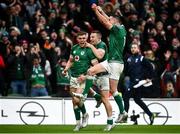 5 February 2022; Garry Ringrose, left, celebrates after scoring his side's fourth try with Andrew Conway, centre, and Jonathan Sexton of Ireland during the Guinness Six Nations Rugby Championship match between Ireland and Wales at the Aviva Stadium in Dublin. Photo by David Fitzgerald/Sportsfile