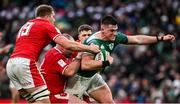 5 February 2022; Dan Sheehan of Ireland is tackled by Seb Davies and Gareth Thomas of Wales during the Guinness Six Nations Rugby Championship match between Ireland and Wales at Aviva Stadium in Dublin. Photo by Brendan Moran/Sportsfile