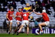 5 February 2022; Shane Meehan of Clare passes under pressure from Cork players, from left, Mark Coleman, Ger Millerick, Sean O'Donoghue and Tim O'Mahony during the Allianz Hurling League Division 1 Group A match between Cork and Clare at Páirc Ui Chaoimh in Cork. Photo by Ben McShane/Sportsfile