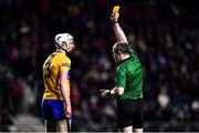 5 February 2022; Referee Johnny Murphy issues a yellow card to Conor Cleary of Clare during the Allianz Hurling League Division 1 Group A match between Cork and Clare at Páirc Ui Chaoimh in Cork. Photo by Ben McShane/Sportsfile