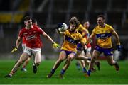 5 February 2022; Manus Doherty of Clare in action against Blake Murphy of Cork during the Allianz Football League Division 2 match between Cork and Clare at Páirc Ui Chaoimh in Cork. Photo by Ben McShane/Sportsfile