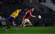 5 February 2022; Sean Powter of Cork in action against Aaron Griffin of Clare during the Allianz Football League Division 2 match between Cork and Clare at Páirc Ui Chaoimh in Cork. Photo by Ben McShane/Sportsfile