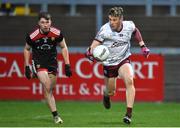 5 February 2022; Shane Walsh of Galway in action against Peter Fegan of Down during the Allianz Football League Division 2 match between Down and Galway at Páirc Esler in Newry, Down. Photo by Oliver McVeigh/Sportsfile