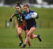 5 February 2022; Ellie Young of CLG Naomh Jude in action against Eimear Horan of Mullinahone LGF during the 2021 currentaccount.ie All-Ireland Ladies Junior Club Football Championship Final match between Mullinahone LGF, Tipperary and CLG Naomh Jude, Dublin at Baltinglass GAA in Baltinglass, Wicklow. Photo by Matt Browne/Sportsfile