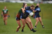 5 February 2022; Ellie Young of CLG Naomh Jude in action against Eimear Horan of Mullinahone LGF during the 2021 currentaccount.ie All-Ireland Ladies Junior Club Football Championship Final match between Mullinahone LGF, Tipperary and CLG Naomh Jude, Dublin at Baltinglass GAA in Baltinglass, Wicklow. Photo by Matt Browne/Sportsfile