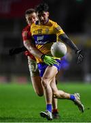 5 February 2022; Aaron Griffin of Clare in action against Kevin Flahive of Cork during the Allianz Football League Division 2 match between Cork and Clare at Páirc Ui Chaoimh in Cork. Photo by Ben McShane/Sportsfile
