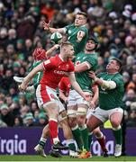 5 February 2022; Garry Ringrose of Ireland attempts to gain possession ahead of teammates Josh van der Flier, James Ryan and Tadhg Furlong and Johnny McNicholl of Wales during the Guinness Six Nations Rugby Championship match between Ireland and Wales at Aviva Stadium in Dublin. Photo by Brendan Moran/Sportsfile