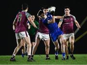 1 February 2022; Ryan McFadden of Letterkenny IT is tackled by Paul Kelly of NUI Galway during the Electric Ireland HE GAA Sigerson Cup Round 2 match between NUI Galway and Letterkenny IT at the Dangan Sports Campus in Galway. Photo by Piaras Ó Mídheach/Sportsfile
