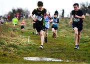 6 February 2022; Lucas Lyons of St Clares CS Manorhamilton, left, and Matthew Kelly of St Geralds College Castlebar compete in the minor boy's race during the Irish Life Health Connacht Schools Cross Country at Bushfield in Loughrea, Galway. Photo by Ben McShane/Sportsfile
