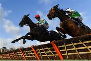 6 February 2022; Party Central, left, with Davy Russell up, jumps the last on their way to winning the Irish Stallion Farms EBF Paddy Mullins Mares Handicap Hurdle, from fourth Minx Tiara, right, with Sean Flanagan up, during day two of the Dublin Racing Festival at Leopardstown Racecourse in Dublin. Photo by Seb Daly/Sportsfile