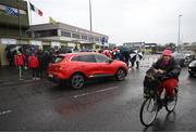 5 February 2022; A cyclist passes Austin Stack Park as supporters queue to enter the ground, almost three hours before throw in, before the Allianz Football League Division 1 match between Kerry and Dublin at Austin Stack Park in Tralee, Kerry. Photo by Stephen McCarthy/Sportsfile