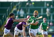 6 February 2022; Tom Morrissey of Limerick is tackled by Liam Óg McGovern of Wexford during the Allianz Hurling League Division 1 Group A match between Wexford and Limerick at Chadwicks Wexford Park in Wexford. Photo by Ray McManus/Sportsfile