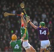 6 February 2022; Barry Nash of Limerick catches the sliotar ahead of team mate Richie English and Conor McDonald of Wexford during the Allianz Hurling League Division 1 Group A match between Wexford and Limerick at Chadwicks Wexford Park in Wexford. Photo by Ray McManus/Sportsfile