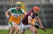 6 February 2022; Conor Whelan of Galway in action against Jack Screeney of Offaly during the Allianz Hurling League Division 1 Group A match between Galway and Offaly at Pearse Stadium in Galway. Photo by Ray Ryan/Sportsfile