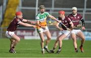 6 February 2022; Adrian Cleary of Offaly in action against Ronan Glennon and Tom Monaghan of Galway during the Allianz Hurling League Division 1 Group A match between Galway and Offaly at Pearse Stadium in Galway. Photo by Ray Ryan/Sportsfile