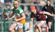 6 February 2022; Killian Sampson of Offaly in action against Tom Monaghan of Galway during the Allianz Hurling League Division 1 Group A match between Galway and Offaly at Pearse Stadium in Galway. Photo by Ray Ryan/Sportsfile