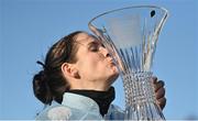 6 February 2022; Jockey Rachael Blackmore kisses the trophy after winning the Chanelle Pharma Irish Champion Hurdle on Honeysuckle during day two of the Dublin Racing Festival at Leopardstown Racecourse in Dublin. Photo by Seb Daly/Sportsfile