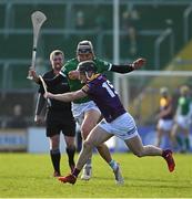 6 February 2022; Mikie Dwyer of Wexford is tackled by Gearoid Hegarty of Limerick during the Allianz Hurling League Division 1 Group A match between Wexford and Limerick at Chadwicks Wexford Park in Wexford. Photo by Ray McManus/Sportsfile