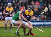 6 February 2022; Mikie Dwyer of Wexford is tackled by Simon Barry Nash of Limerick on his way to scoring a goal, in the 23rd minute of the second half, during the Allianz Hurling League Division 1 Group A match between Wexford and Limerick at Chadwicks Wexford Park in Wexford. Photo by Ray McManus/Sportsfile