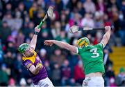 6 February 2022; Conor McDonald of Wexford wins possession ahead of Dan Morrissey of Limerick during the Allianz Hurling League Division 1 Group A match between Wexford and Limerick at Chadwicks Wexford Park in Wexford. Photo by Ray McManus/Sportsfile