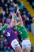 6 February 2022; Conor McDonald of Wexford wins possession ahead of Dan Morrissey of Limerick during the Allianz Hurling League Division 1 Group A match between Wexford and Limerick at Chadwicks Wexford Park in Wexford. Photo by Ray McManus/Sportsfile