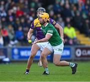 6 February 2022; Tom Morrissey of Limerick is tackled by Jack O'Connor of Wexford during the Allianz Hurling League Division 1 Group A match between Wexford and Limerick at Chadwicks Wexford Park in Wexford. Photo by Ray McManus/Sportsfile