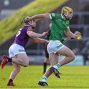 6 February 2022; Dan Morrissey of Limerick is tackled by Mikie Dwyer of Wexford during the Allianz Hurling League Division 1 Group A match between Wexford and Limerick at Chadwicks Wexford Park in Wexford. Photo by Ray McManus/Sportsfile