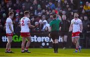 6 February 2022; Referee David Gough shows a red card to Tyrone players, from left,  Peter Harte, Michael McKernan and Padraig Hampsey during the Allianz Football League Division 1 match between Armagh and Tyrone at the Athletic Grounds in Armagh. Photo by Brendan Moran/Sportsfile