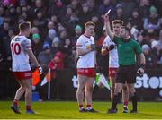 6 February 2022; Referee David Gough shows a red card to Tyrone players, from left, Kieran McGeary, Peter Harte and Michael McKernan during the Allianz Football League Division 1 match between Armagh and Tyrone at the Athletic Grounds in Armagh. Photo by Brendan Moran/Sportsfile