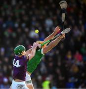 6 February 2022; Dan Morrissey of Limerick is tackled by Conor McDonald of Wexford during the Allianz Hurling League Division 1 Group A match between Wexford and Limerick at Chadwicks Wexford Park in Wexford. Photo by Ray McManus/Sportsfile