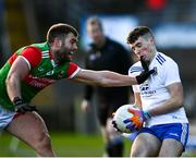 6 February 2022; Aaron Mulligan of Monaghan in action against Aidan O'Shea of Mayo during the Allianz Football League Division 1 match between Monaghan and Mayo at St Tiernach's Park in Clones, Monaghan. Photo by David Fitzgerald/Sportsfile