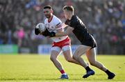 6 February 2022; Padraig Hampsey of Tyrone is tackled by Rian O'Neill of Armagh during the Allianz Football League Division 1 match between Armagh and Tyrone at the Athletic Grounds in Armagh. Photo by Brendan Moran/Sportsfile