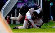 6 February 2022; Peter Harte of Tyrone and Jarly Og Burns of Armagh tussle off the ball during the Allianz Football League Division 1 match between Armagh and Tyrone at the Athletic Grounds in Armagh. Photo by Brendan Moran/Sportsfile