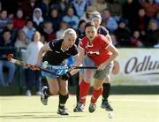 4 April 2004; Claire Redpath, Pegasus, in action against Catriona Carey, Hermes. Womens Irish Senior Cup Final 2003-2004, Hermes v Pegasus, Belfield, Dublin. Picture credit; Brian Lawless / SPORTSFILE *EDI*