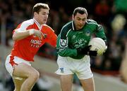 4 April 2004; Colm Hickey, Limerick, in action against Tony McEntee, Armagh . Allianz Football League, Division 1B, Round 7, Limerick v Armagh, Gaelic Grounds, Limerick. Picture credit; David Maher / SPORTSFILE *EDI*