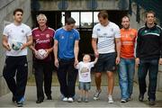 30 July 2013; Conal Clancy, age 3, from Ennis, Co. Clare, with, from left to right, Bernard Brogan, Dublin, RTE sports presenter Michael Lyster, Stephen Cluxton, Dublin, Rhys Ruddock, Leinster, Kieran McKeever, Armagh, and Kildare manager Kieran McGeeney in attendance at the launch of the Temple Street Children's University Hospital 'Support Your Colours Ball', Croke Park, Dublin. Picture credit: David Maher / SPORTSFILE
