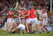 28 July 2013; Cork and Kilkenny players tussle during the first half. GAA Hurling All-Ireland Senior Championship, Quarter-Final, Cork v Kilkenny, Semple Stadium, Thurles, Co. Tipperary. Picture credit: Stephen McCarthy / SPORTSFILE