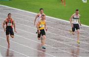 28 July 2013; Curtis Woods, 217, from North Down A.C. Co Down, on his way two winning his heat in the 100m during a heavy rainshower from Ferdia Kenny, left, from Sli Cualann A.C, John Keegan from Crusaders A.C. and Dylan Archbold from Raheny Shamrock A.C. at the Woodie’s DIY National Senior Track and Field Championships. Morton Stadium, Santry, Co. Dublin. Picture credit: Matt Browne / SPORTSFILE