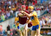 28 July 2013; Cian Dillon, Clare, clears under pressure from Galway's Joe Canning. GAA Hurling All-Ireland Senior Championship, Quarter-Final, Galway v Clare, Semple Stadium, Thurles, Co. Tipperary. Picture credit: Ray McManus / SPORTSFILE